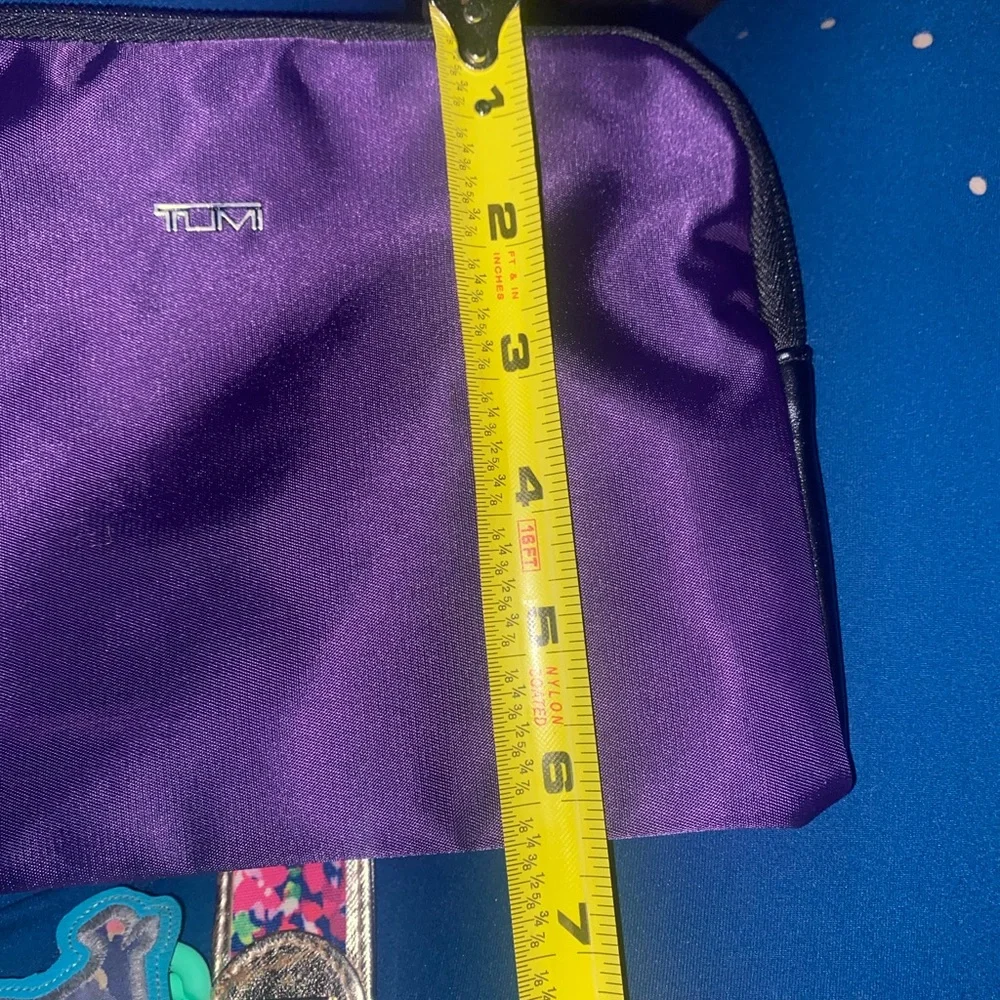 Tumi for delta travel purple bag